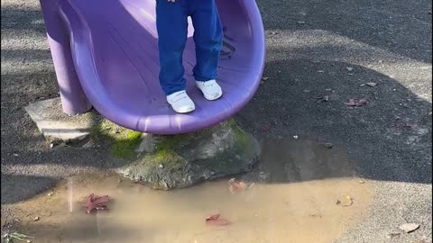 Trying to Jump Over Puddle
