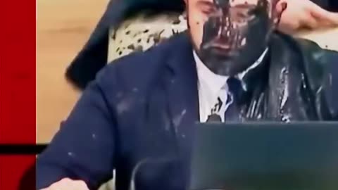 Moment Georgia Election Chief Doused in Paint by Opposition Official