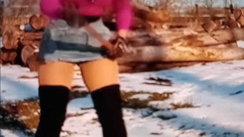 Choppin wood in miniskirt