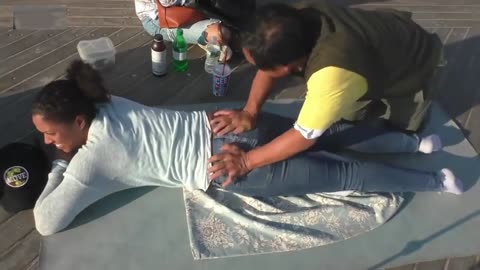 Luodong Massages Skinny Black Woman On The Boardwalk