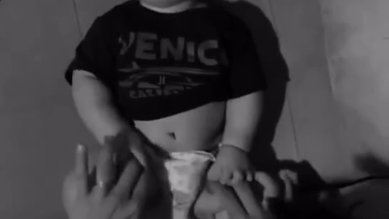 baby and dad enjoy the moment