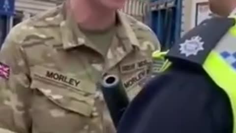 British solider smashes into a Policeman for arresting people for 'words