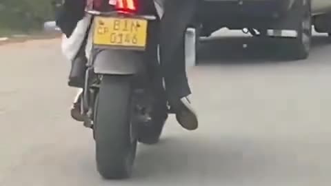 People dance for motor bike