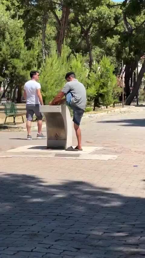 This is Italy. In fountain where children drink, the usual suspect washes his feet