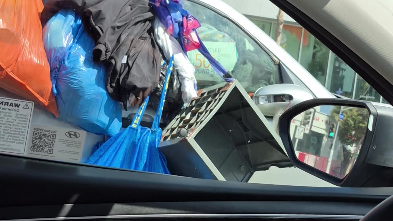 Piles Of Garbage Obstruct Car's View