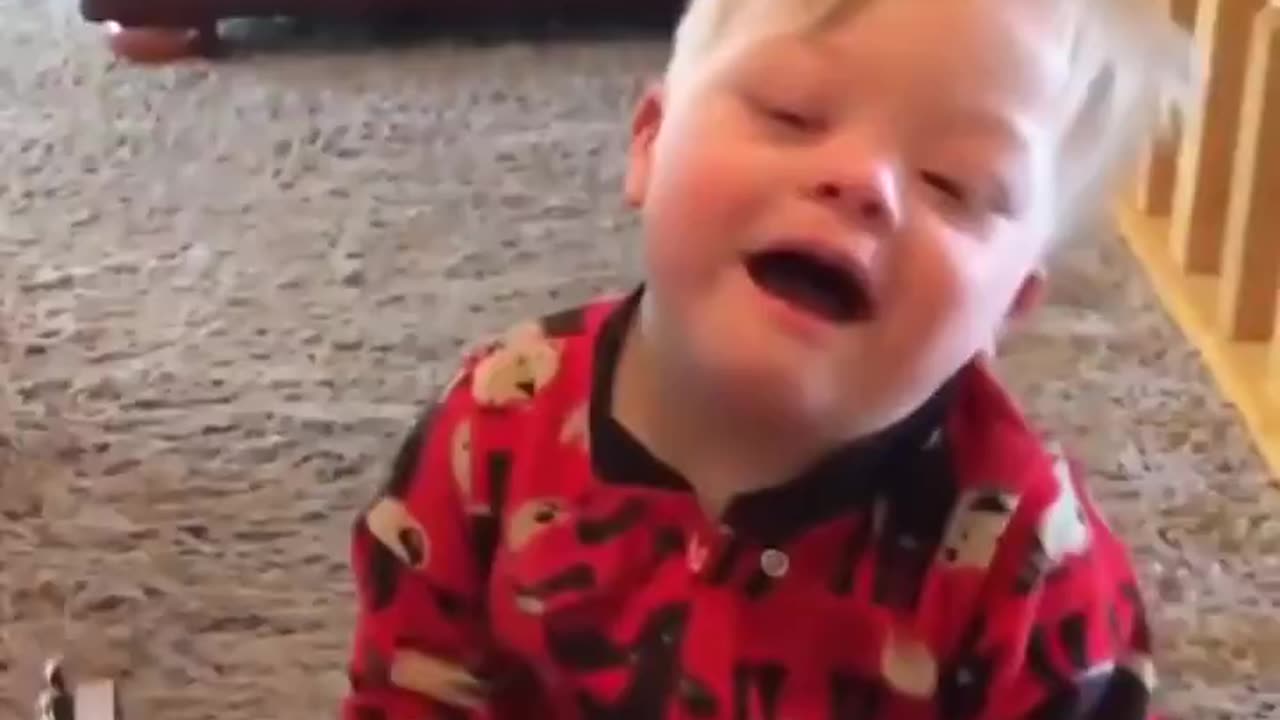 2 year old Bo with Down syndrome starts singing a miracle happens!