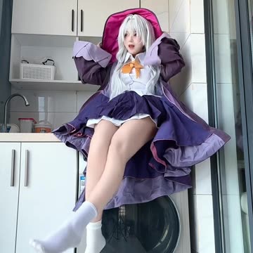 Cute Girl in Mini Skirt Sitting