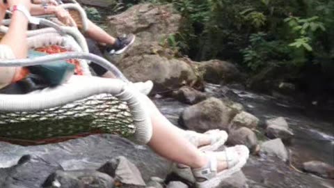 Flying Over the Water in Basket Chairs