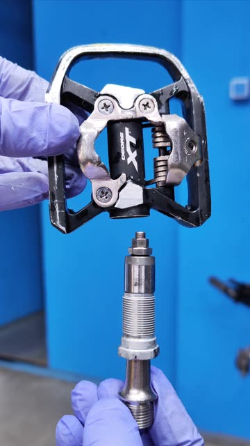 Shimano XT bicycle pedal construction revealed.