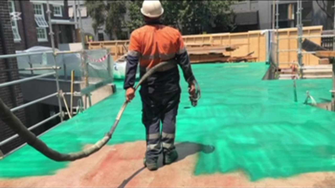 Polyurea Spraying - Concrete Podium Deck