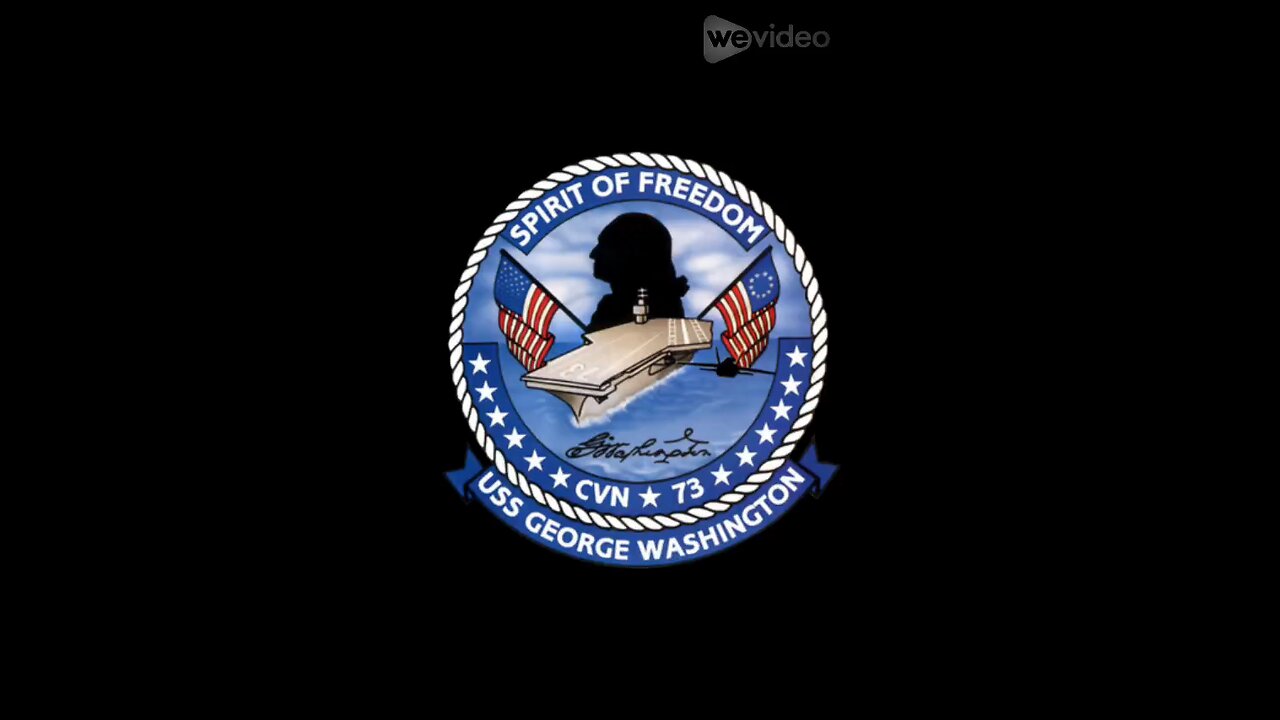 spotlighting the aircraft carrier George Washington