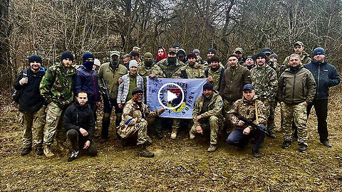 "People-In-Fatigues" helping "English-Speaking-Tourists" in Ukraine
