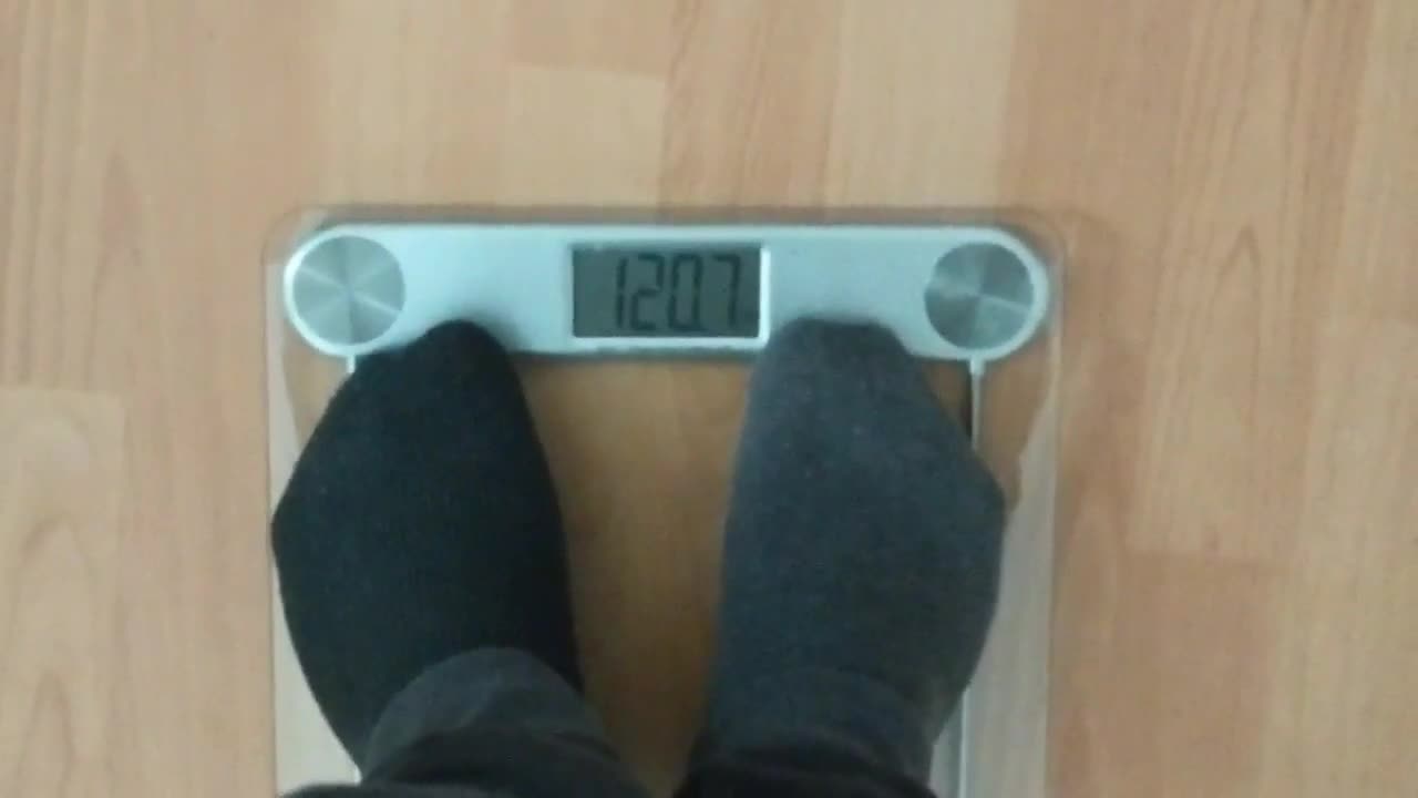 Josh Moon steps on scale Weight: 120.7kg