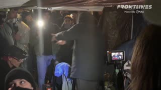 Portland Police officers are raiding the Antifa supply tent next to the ICE building.