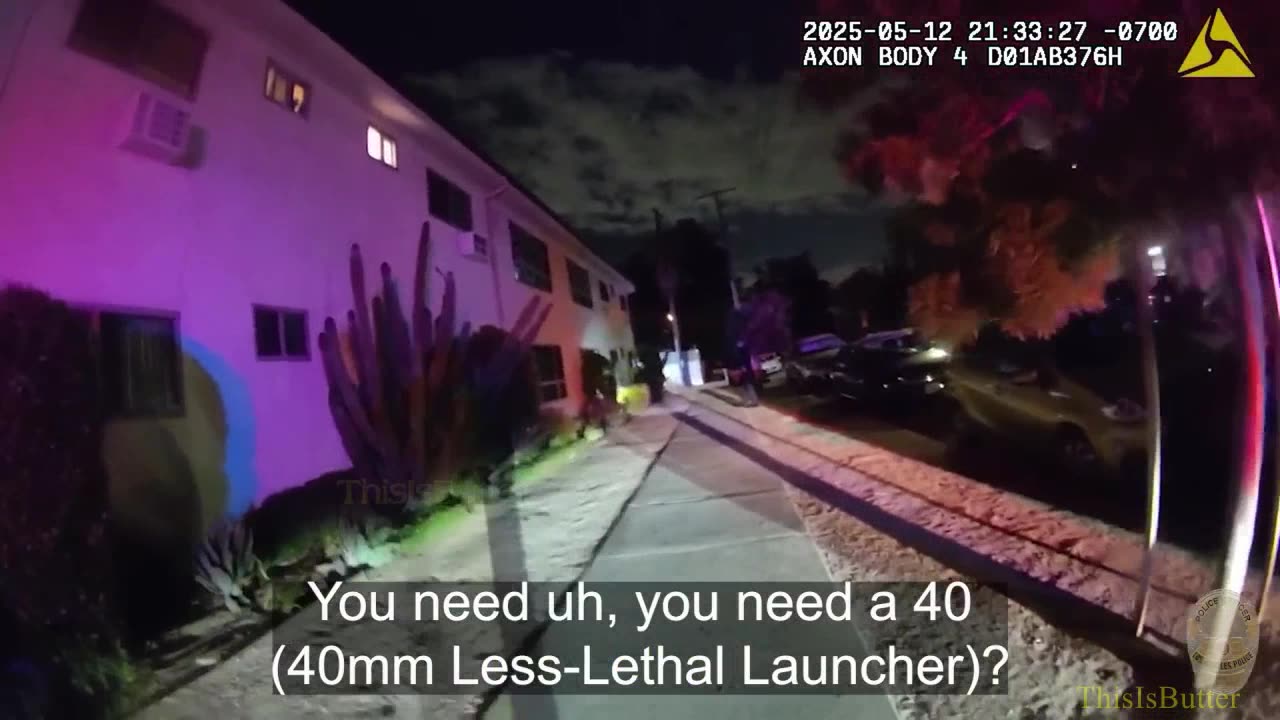 LAPD officers shoot man armed with knife at an apartment building