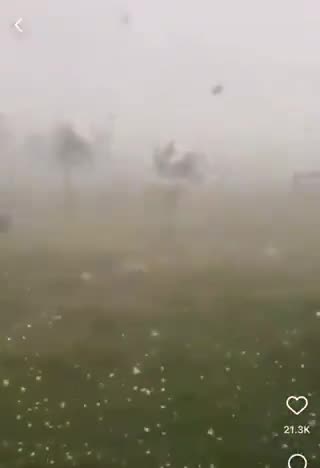 Baseball-sized hail just dropped outta the sky in Cheyenne Wyoming… in the