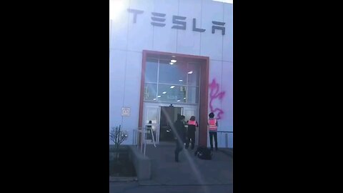 BREAKING: Climate change activists attack Tesla store in Montreal, Canada.