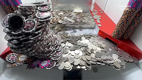 World’s largest wall of poker chips inside a high limit coin pusher
