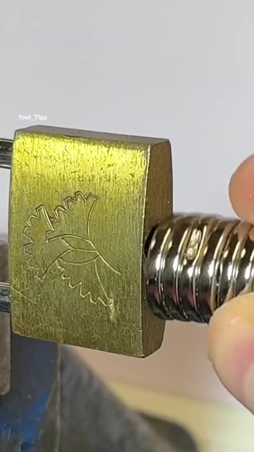 Unlocking a Brass Padlock with a Spiral Key Tool