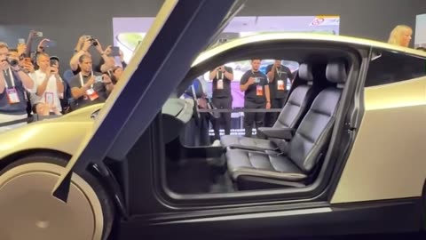 Tesla unveils Cybercab in Paris,