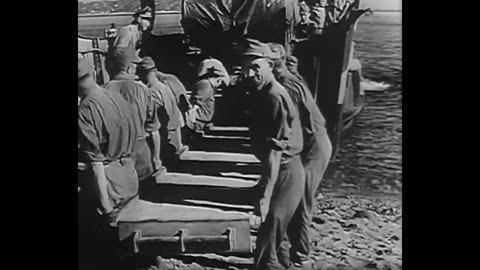 88mm_flak_gun_coming_ashore_in_sicily_in_1943