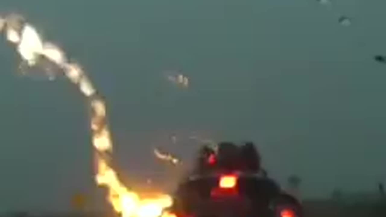 Lighting hitting a car