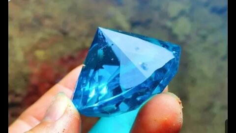 Giant Blue Diamond. There Are Many Precious Stones Inlaid On The Boulders In The Cave.