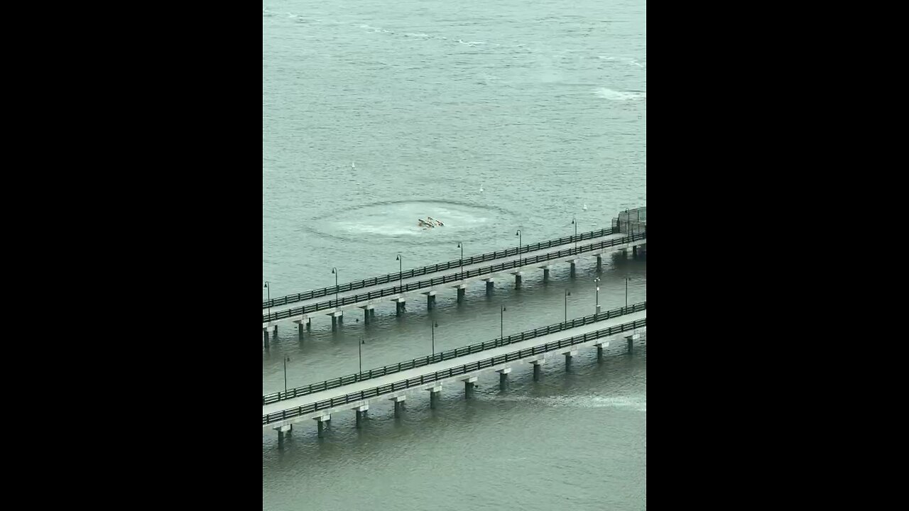 Helicopter crashes into the Hudson River in New York City.