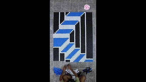 Built a #3d staircase illusion using 1,872 bottle caps! ♻️🧱