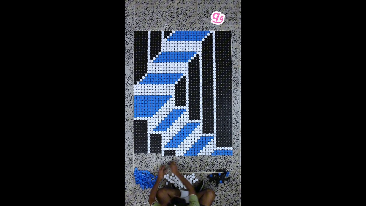 Built a #3d staircase illusion using 1,872 bottle caps! ♻️🧱
