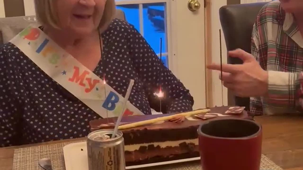 Grandma Tries to Blow Out Sparkler Candles