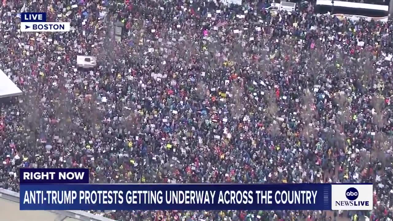 Thousands of protesters have flooded the streets of Boston demonstrating