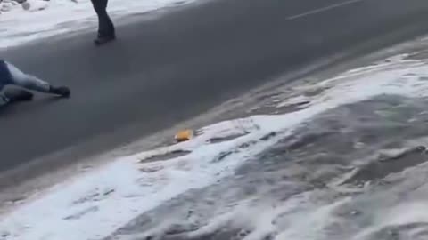 BREAKING: ICE agent in Minneapolis just violently SHOVED a man filming