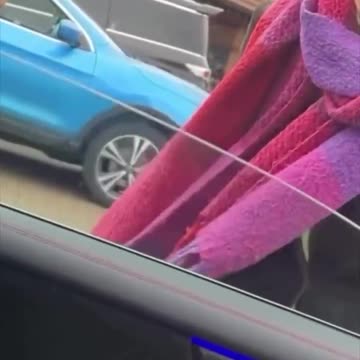 A British local asks a woman in a Burkha to move out of a disabled parking spot