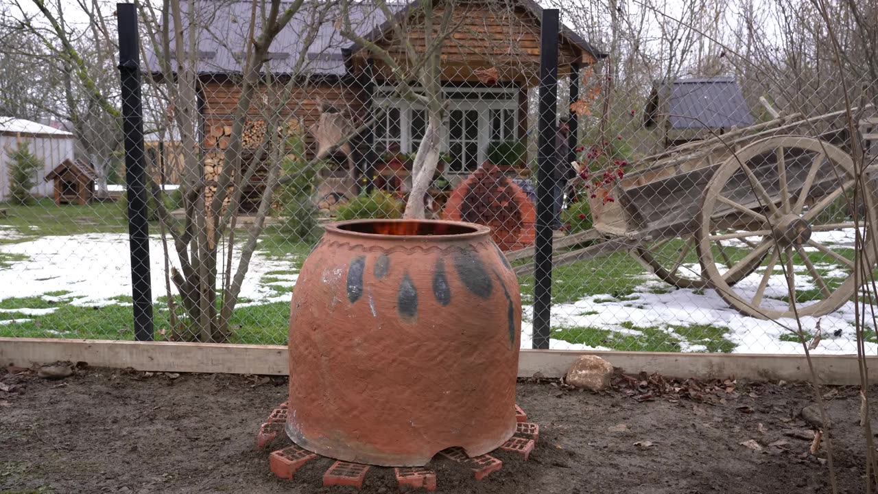 Tandoor Oven - Built and Cooking Lamb and Vegetables Inside
