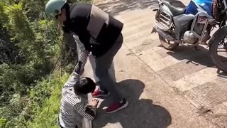 This couple rescues a guy hanging from a cliff!.hd