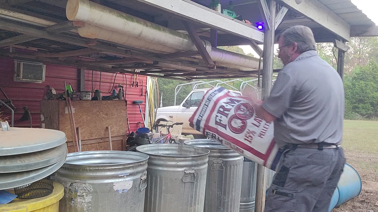 Restocking the chicken feed and filling the deer feeders.