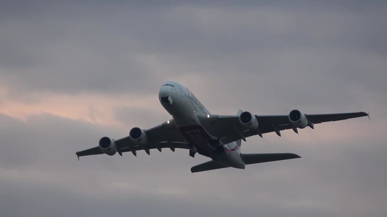 A380-800 of Emirates Airlines soars into the gloomy autumn sky over Moscow