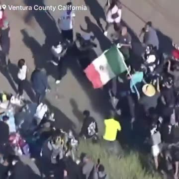 Anti-ICE protesters are assaulting an adult man in civilian clothing in Southern California