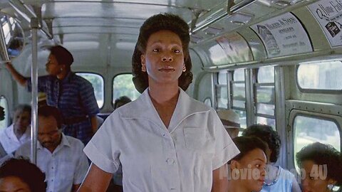 They send her to sit at the back of the bus for being different from them