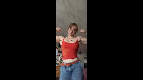 Beutiful Redhead dancing and flexing