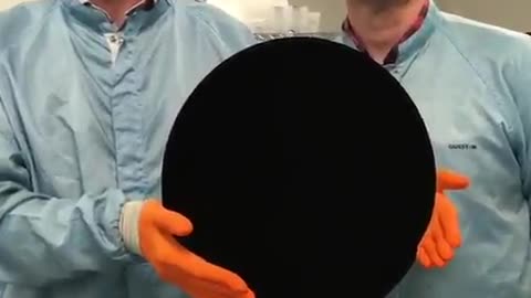 Ball covered in Vantablack, which absorbs 99.965% of visible light