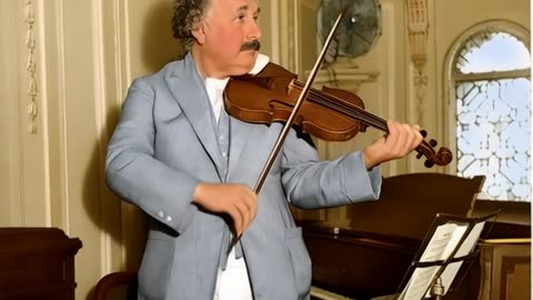 ALBERT EINSTEIN PLAYING VIOLIN