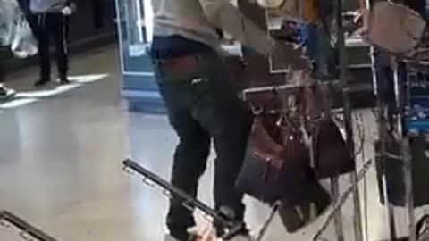 Not an ounce of shame from these worthless nier scums looting a Dress for Less store