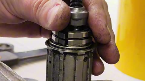 How to press industrial sealed bearings out of a bicycle wheel freehub body