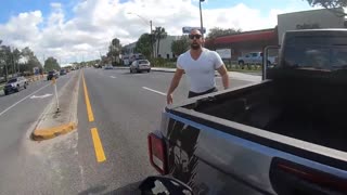 Motorcyclist hits a driver's truck because he pulled out in front of him