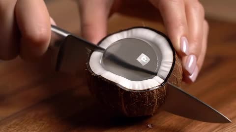 🥥✨ Glass coconut getting sliced with pure perfection!