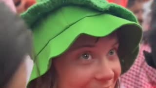 Greta wears a frog hat among Muslim men in Tunisia. How would this story end without the cameras?