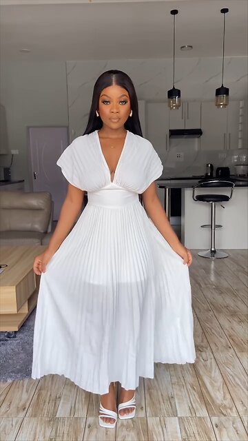 Graceful Deep V-Neck Maxi Dress Featuring Folded Detailing and Flowing Sleeves🤍