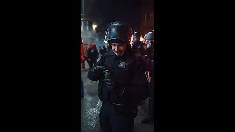 Police throw smoke grenades at protesters and laugh